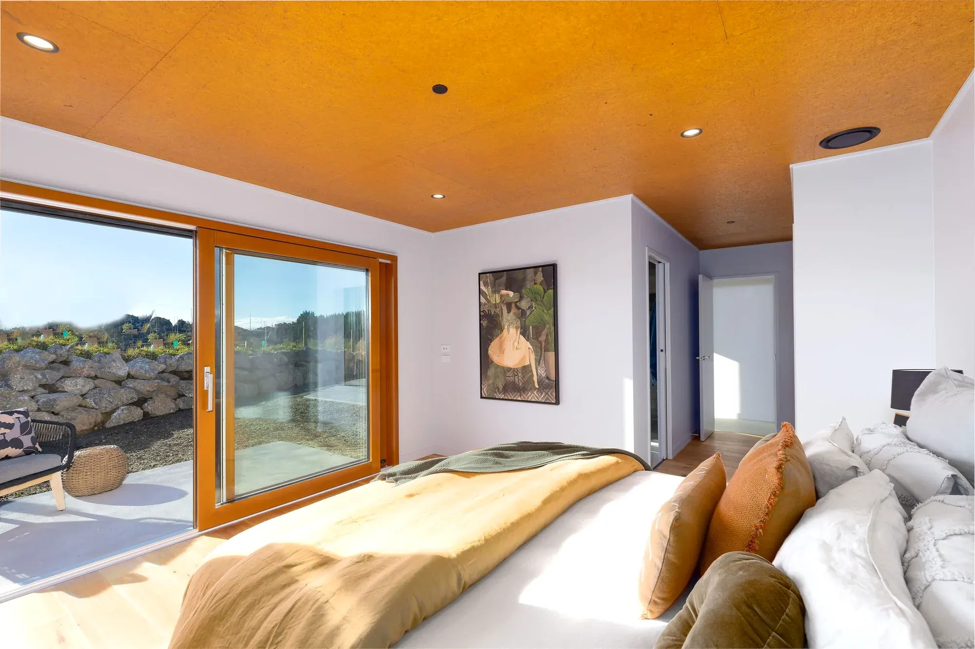 Bedroom at Horton Road, an Ecotectural home ventilated with balanced heat-recovery