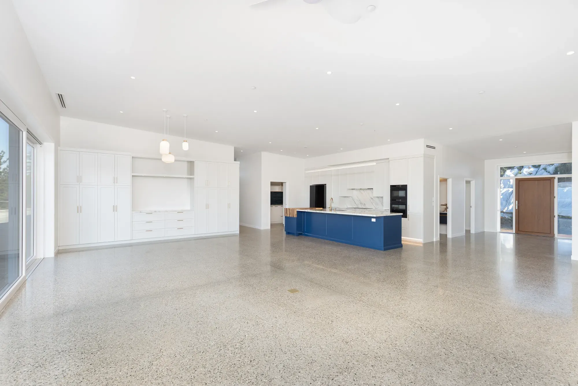 Open-plan living area inside The Blue House, Upper Moutere