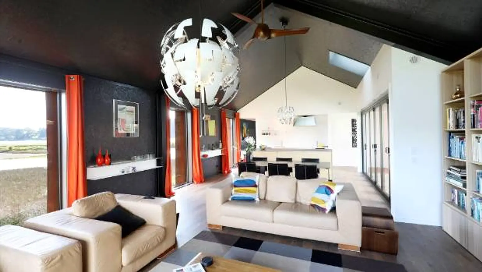 Lounge inside The Black House with its exposed OSB lining, Tasman