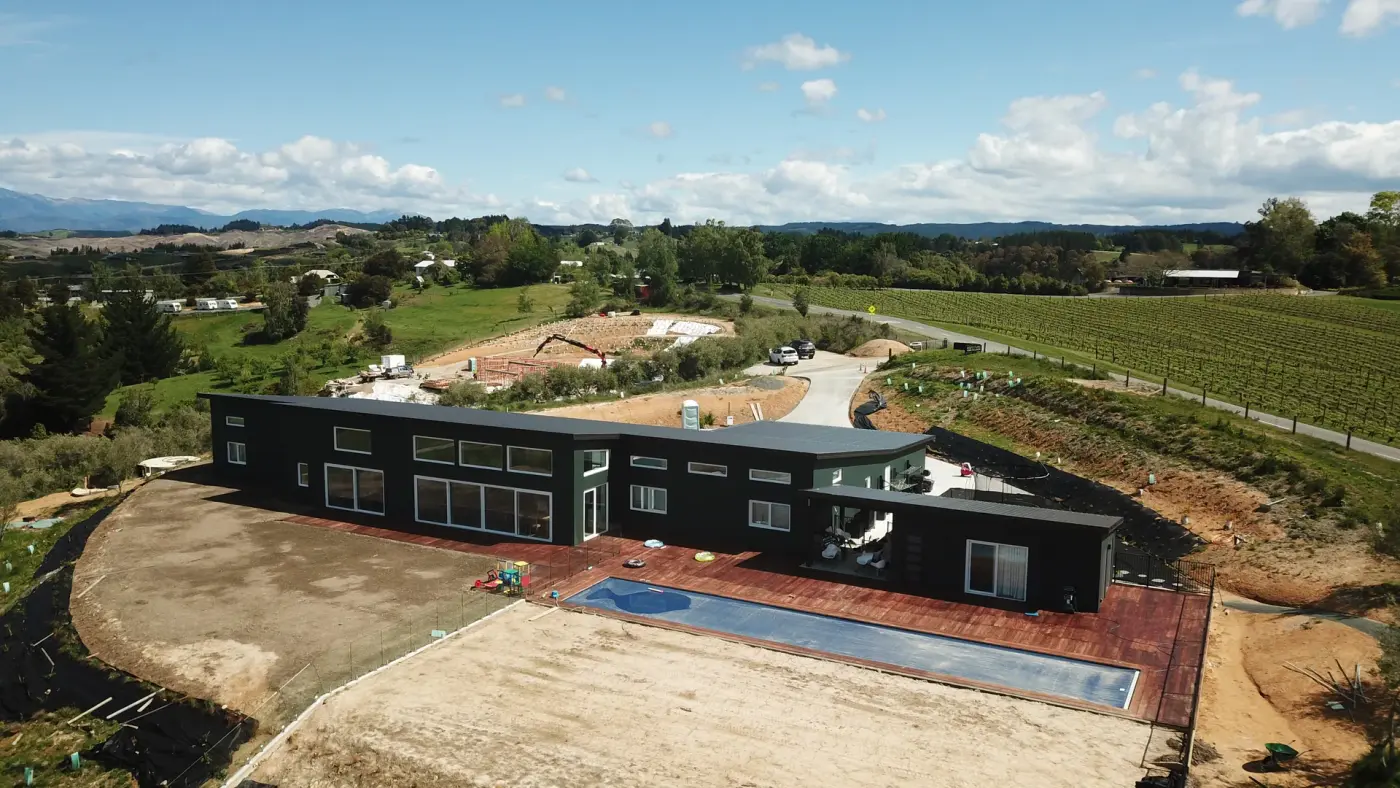 Top-down aerial of The Green House and its pool, Upper Moutere