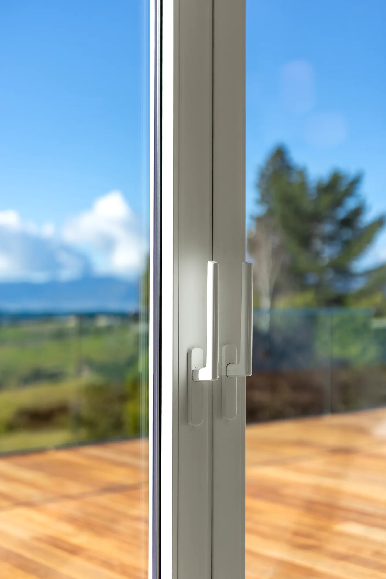 Double sliding-door handles on high-performance glazed joinery in an Ecotectural home