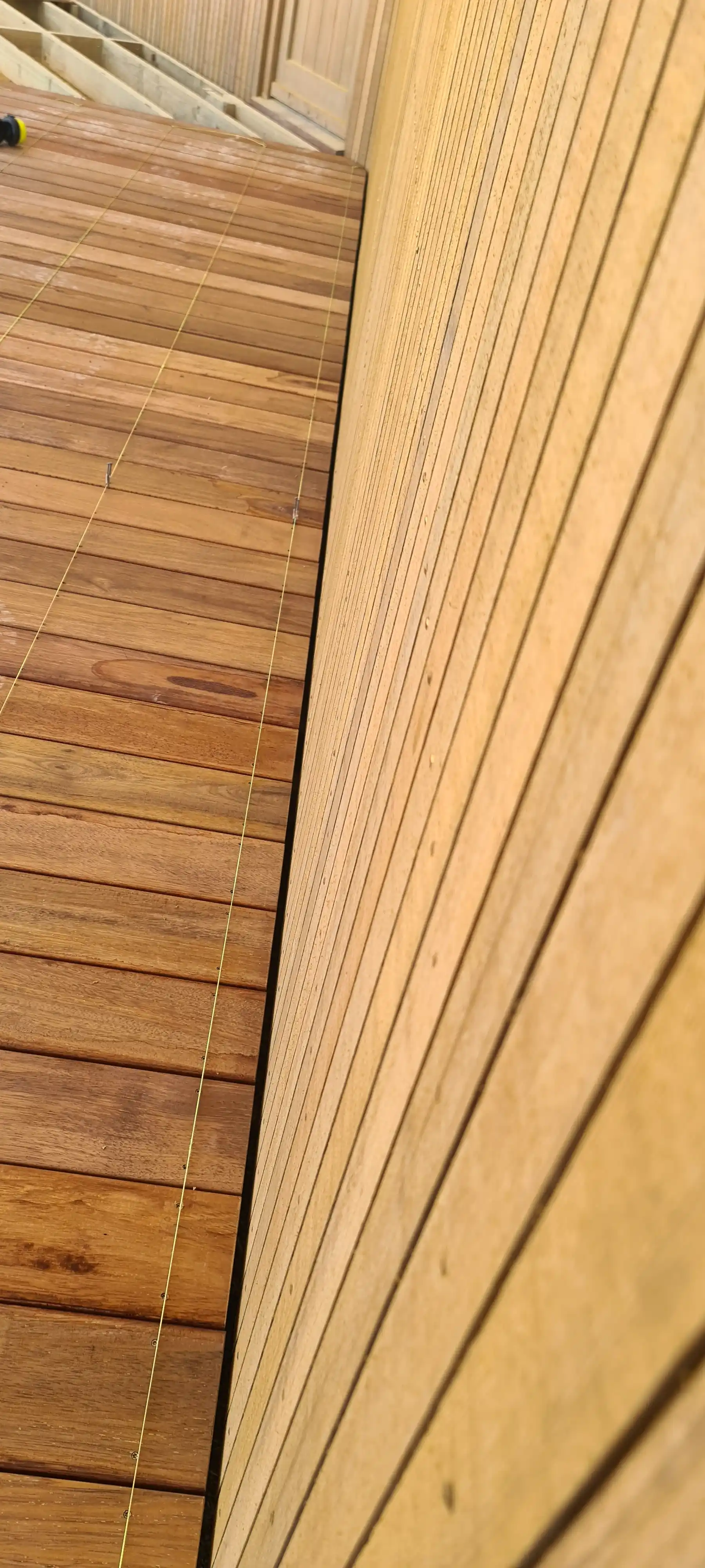 Vertical cedar weatherboard cladding detail on the Tasman View build