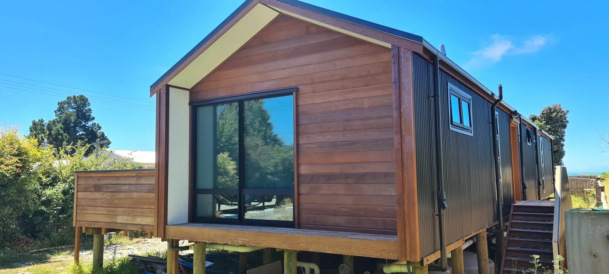 The Cedar House under construction on timber piles, Motueka
