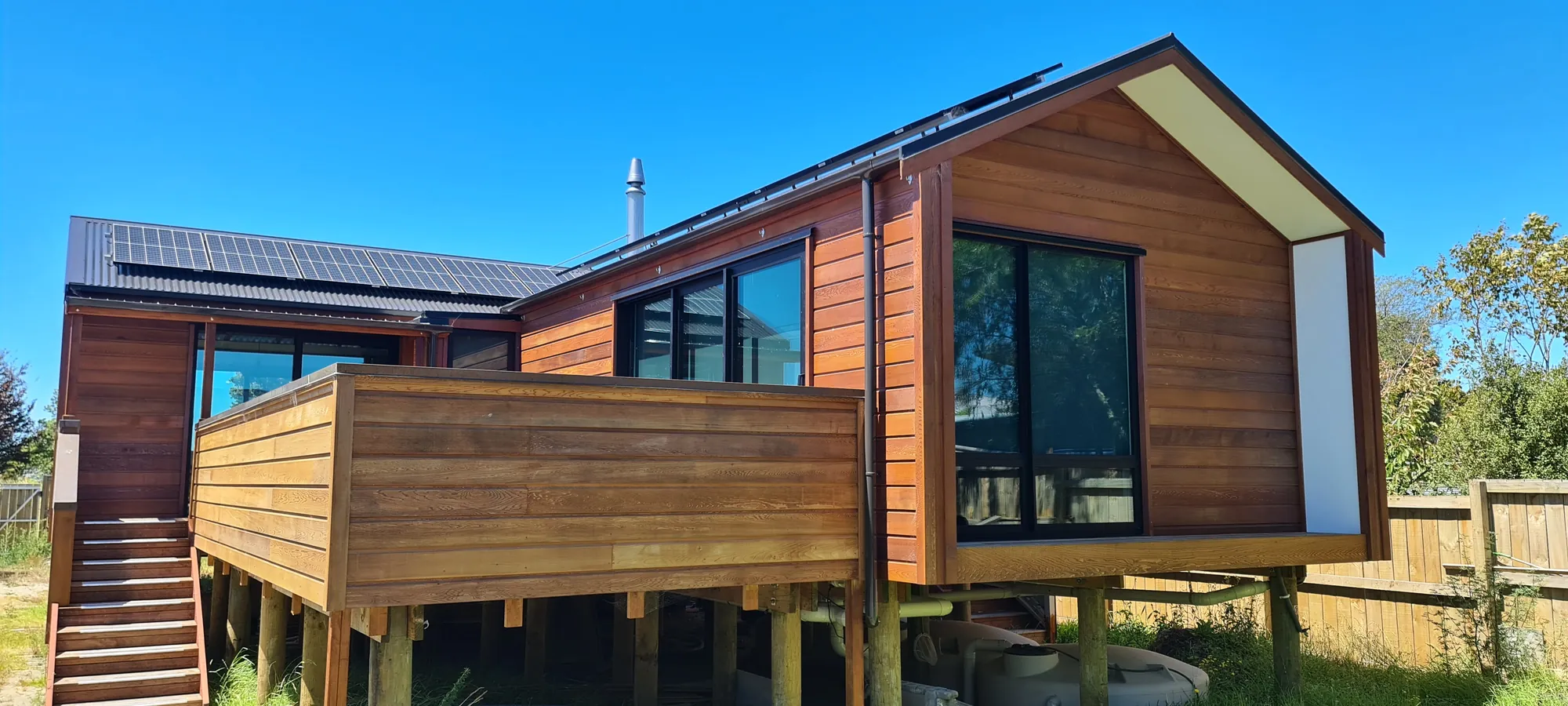 Custom cedar-clad gable home by Ecotectural above the Motueka estuary