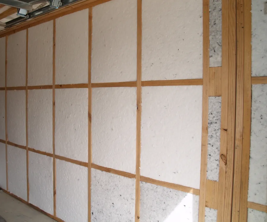 Mammoth polyester insulation batts installed in a timber frame