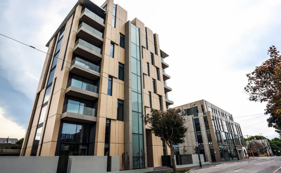 Weathering-steel rainscreen cladding with a deep patina